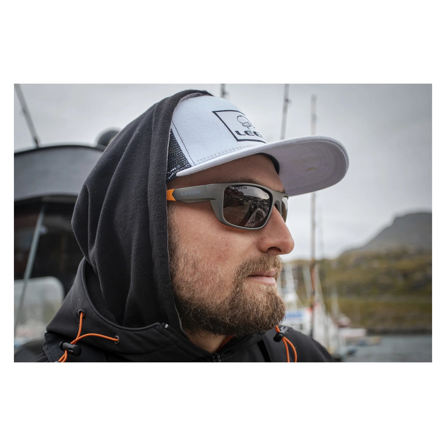 Fiskebriller med kobberfarget linse